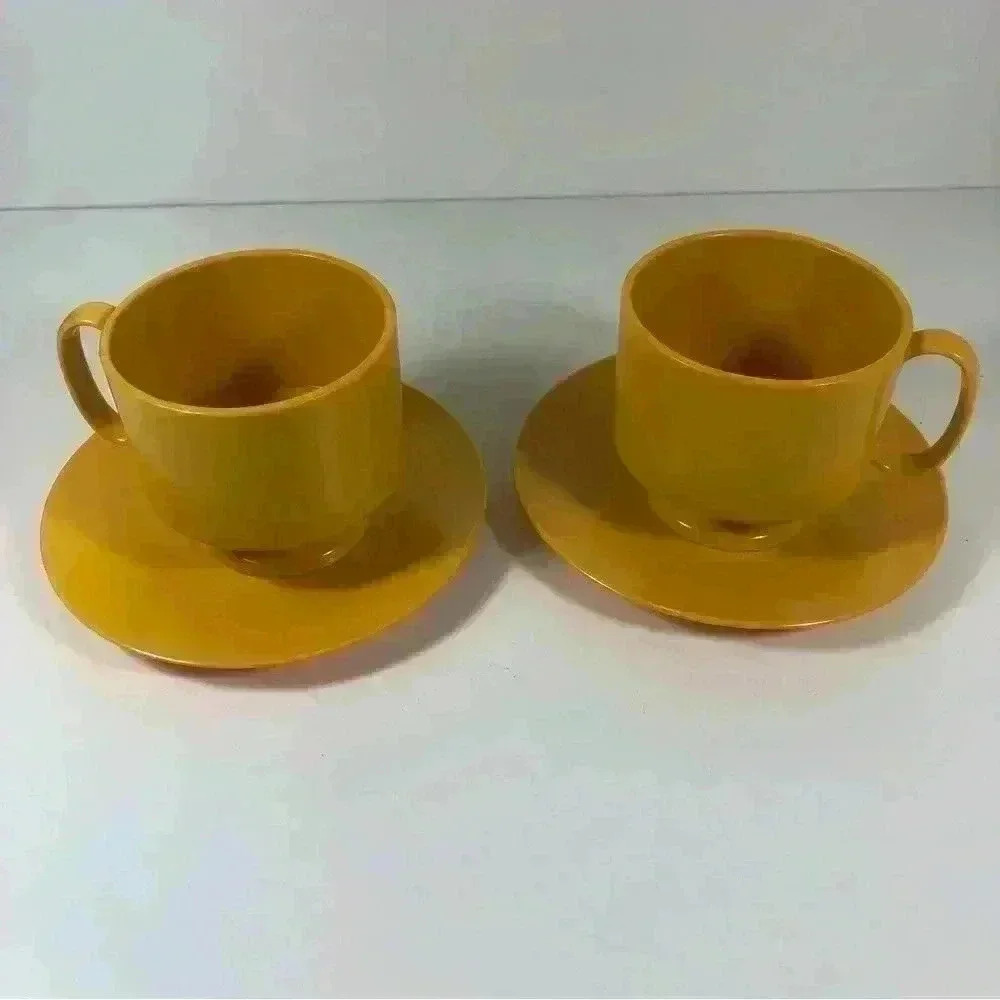 Set of 2 vintage Melamine teacups with saucers in sunshine yellow